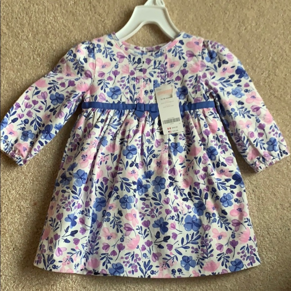 Cute dress for 12-18 months. NWT.